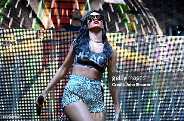 Singer Rihanna performs with DJ Calvin Harris during Day 3 of the 2012 Coachella Valley Music & Arts Festival held at the Empire Polo Club on April...