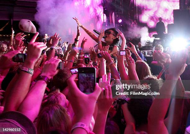 Singer Rihanna performs with Calvin Harris during Day 3 of the 2012 Coachella Valley Music & Arts Festival held at the Empire Polo Club on April 15,...