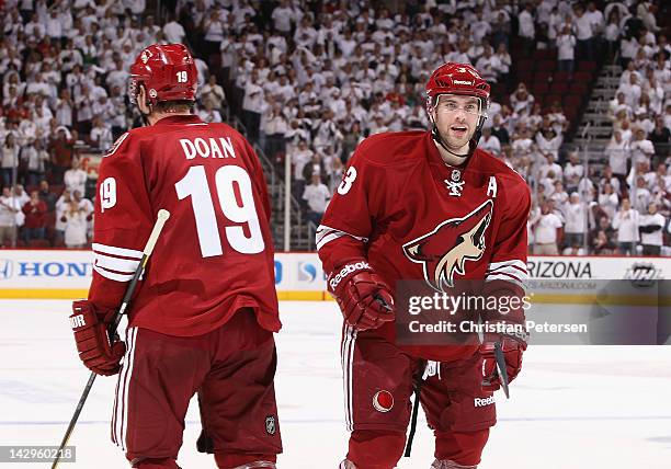 Keith Yandle of the Phoenix Coyotes celebrates with Shane Doan after Game One of the Western Conference Quarterfinals against the Chicago Blackhawks...