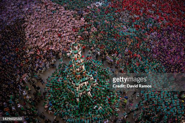 Members of the colla 'Castellers de Vilafranca build a human tower during the 28th Tarragona Competition on October 2, 2022 in Tarragona, Spain. The...