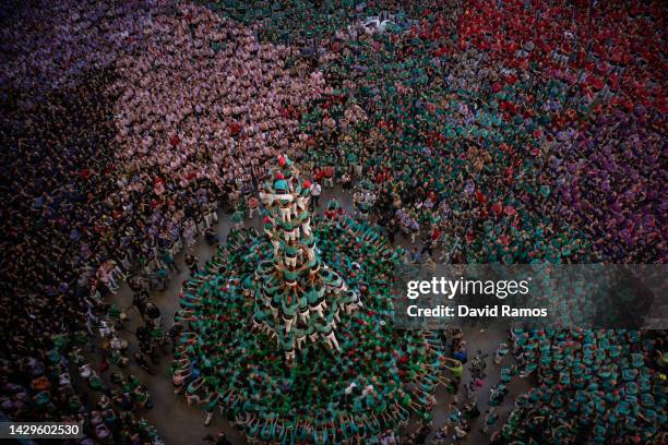 Members of the colla 'Castellers de Vilafranca' build a human tower during the 28th Tarragona Competition on October 2, 2022 in Tarragona, Spain. The...