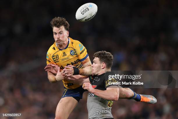 Clinton Gutherson of the Eels and Liam Martin of the Panthers compete for the ball during the 2022 NRL Grand Final match between the Penrith Panthers...