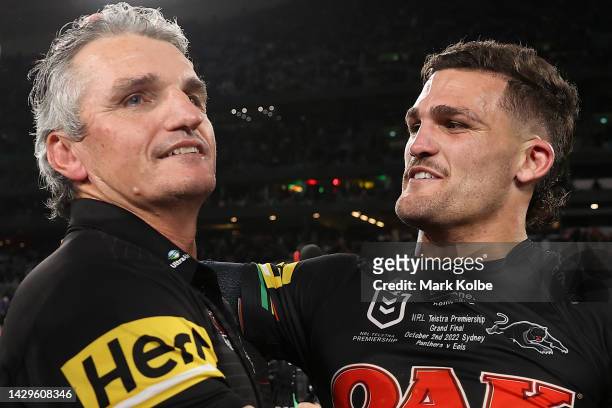 Nathan Cleary of the Panthers and Panthers coach Ivan Cleary embrace as they celebrate victory in the 2022 NRL Grand Final match between the Penrith...