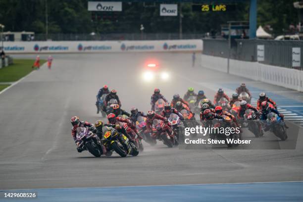 Race start - the MotoGP field rides into the first turn during the race of the MotoGP OR Thailand Grand Prix at Chang International Circuit on...