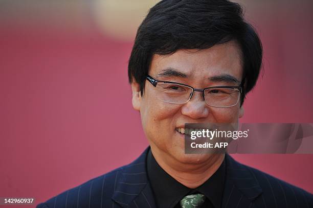 Hong Kong actor Wong Bak-ming smiles as he walks down the red carpet at the 31st Hong Kong Film Awards on April 15, 2012. The annual awards are the...
