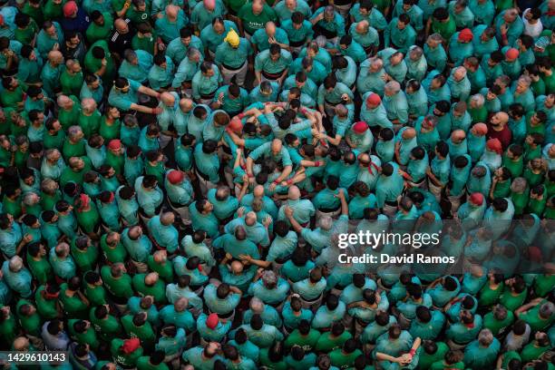 Members of the colla 'Castellers de Vilafranca' build a human tower during the 28th Tarragona Competition on October 2, 2022 in Tarragona, Spain. The...