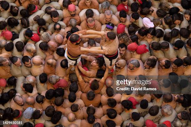 Members of the colla 'Xiquets de Reus' build a human tower during the 28th Tarragona Competition on October 2, 2022 in Tarragona, Spain. The...