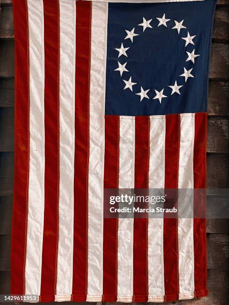 hanging betsy ross flag - colonial flag stock pictures, royalty-free photos & images