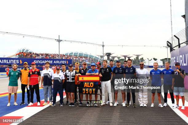 The F1 drivers pose for a photo to celebrate the 350th F1 race start of Fernando Alonso of Spain and Alpine F1 prior to the F1 Grand Prix of...