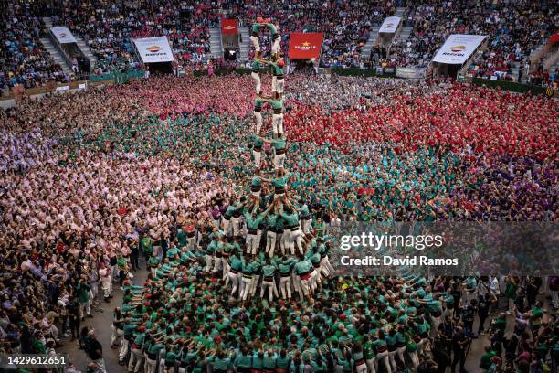 Members of the colla 'Castellers de Vilafranca' build a human tower during the 28th Tarragona Competition on October 2, 2022 in Tarragona, Spain. The...