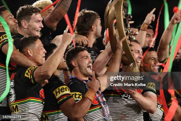 Nathan Cleary and Isaac Yeo of the Panthers hold aloft the NRL Premiership Trophy after victory in the 2022 NRL Grand Finalduring the 2022 NRL Grand...