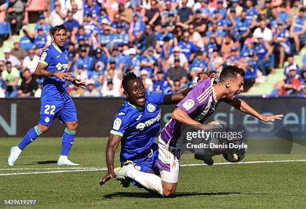 Djene Dakonam of Getafe CF fouls Oscar Plano of Real Valladolid resulting in a penalty kick goal for Real Valladolid during the LaLiga Santander...