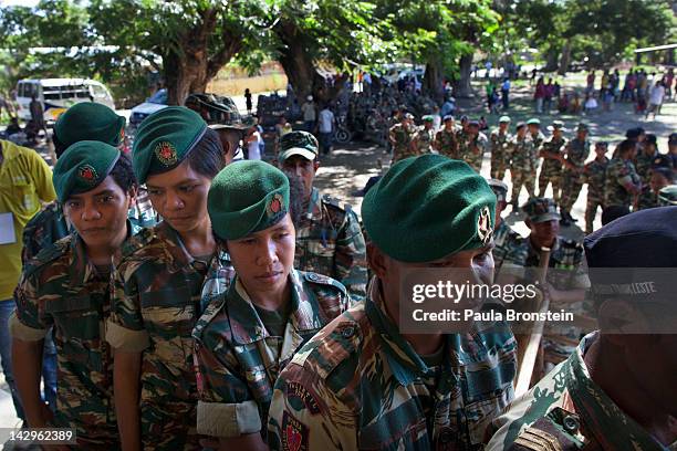 East Timorese military wait in line to vote in the run-off Presidential elections on April 16, 2012 in Dili, East Timor. The second round run-off,...