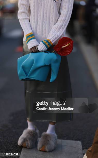 Kiwi Lee Han seen wearing a total loewe look, outside Loewe during Paris Fashion Week on September 30, 2022 in Paris, France.