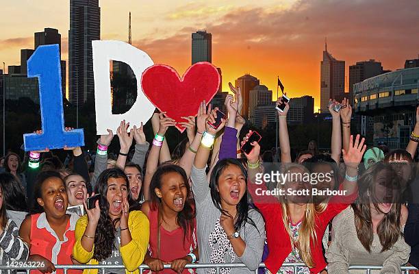 Fans yell as they wait for the gates to open outside of the One Direction concert at Hisense Arena on April 16, 2012 in Melbourne, Australia.