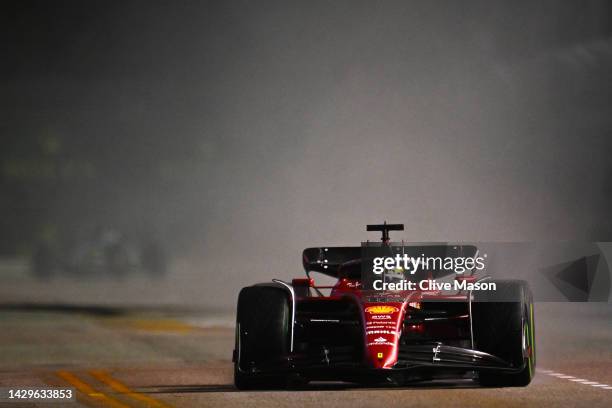 Charles Leclerc of Monaco driving the Ferrari F1-75 on his way to the grid prior to the F1 Grand Prix of Singapore at Marina Bay Street Circuit on...