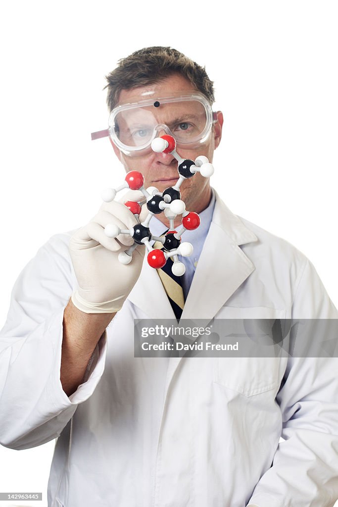 Scientist With Molecular Model