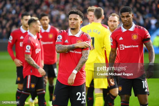 Jadon Sancho and Marcus Rashford of Manchester United look on ahead of the Premier League match between Manchester City and Manchester United at...