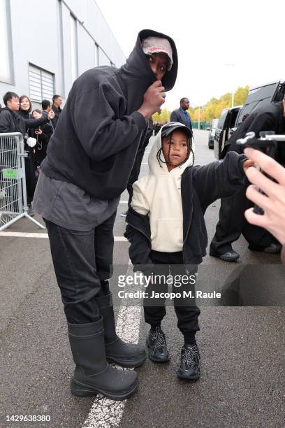 Kanye West and Saint West attend the Balenciaga Womenswear Spring/Summer 2023 show as part of Paris Fashion Week on October 02, 2022 in Villepinte,...