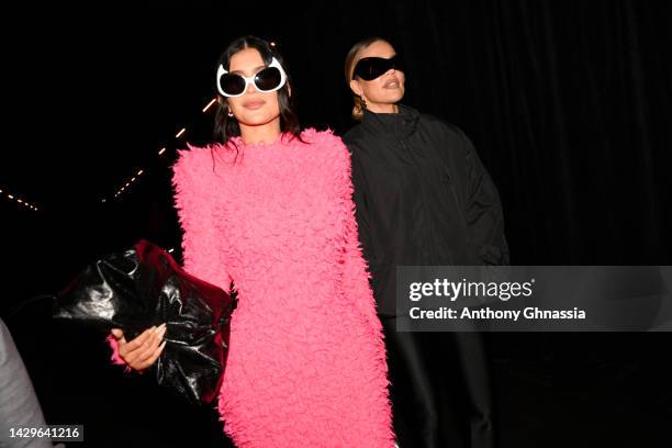 Kylie Jenner and Khloé Kardashian attend the Balenciaga Womenswear Spring/Summer 2023 show as part of Paris Fashion Week on October 02, 2022 in...