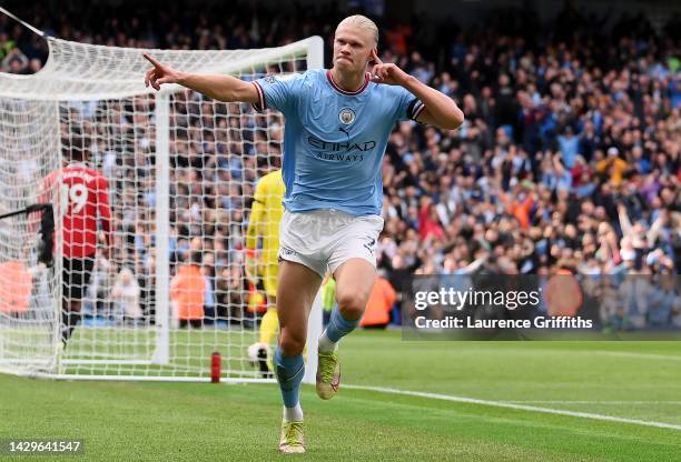 Erling Haaland of Manchester City celebrates their sides third goal during the Premier League match between Manchester City and Manchester United at...