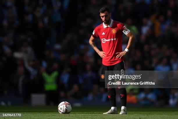 Bruno Fernandes of Manchester United cuts a dejected figure as Erling Haaland of Manchester City scores their sides third goal during the Premier...