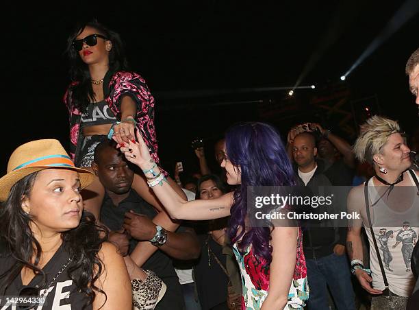 Singers Rihanna and Katy Perry in the audience during day 3 of the 2012 Coachella Valley Music & Arts Festival at the Empire Polo Field on April 15,...