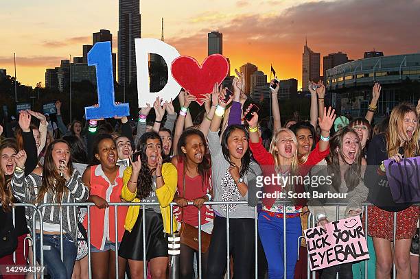 Fans yell as they wait for the gates to open outside of the One Direction concert at Hisense Arena on April 16, 2012 in Melbourne, Australia.