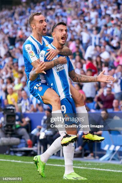 Joselu Mato of RCD Espanyol celebrates with Sergi Darder after scoring his team's first goal during the LaLiga Santander match between RCD Espanyol...