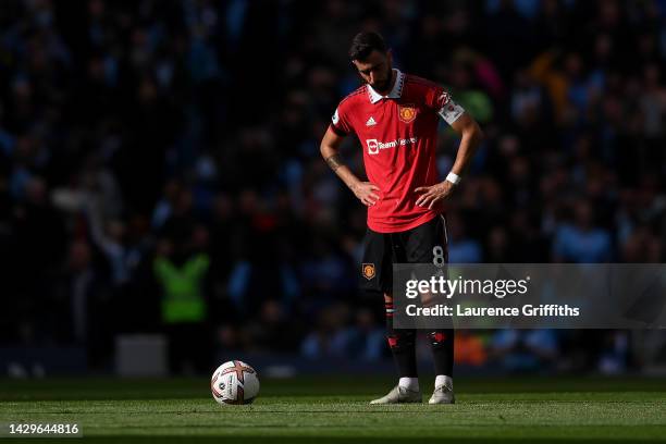 Bruno Fernandes of Manchester United cuts a dejected figure as Erling Haaland of Manchester City scores their sides third goal during the Premier...