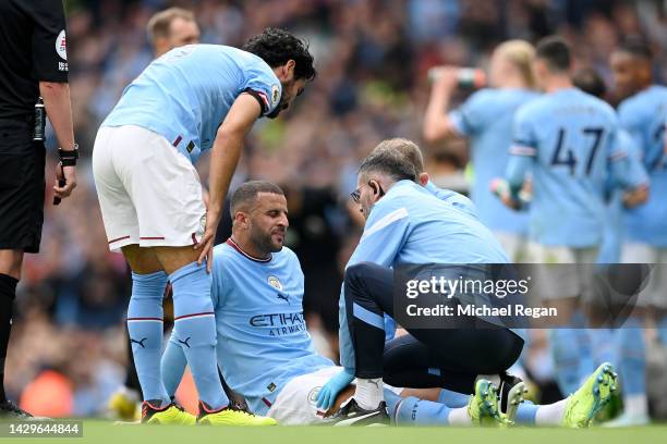 Kyle Walker of Manchester City receives medical attention during the Premier League match between Manchester City and Manchester United at Etihad...