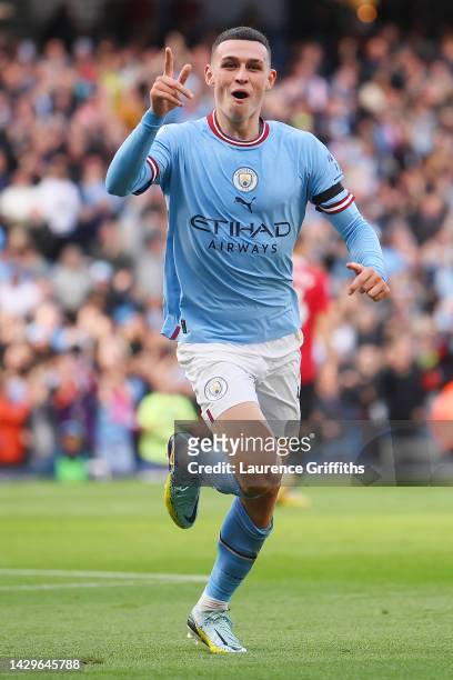 Phil Foden of Manchester City celebrates their sides fourth goal during the Premier League match between Manchester City and Manchester United at...