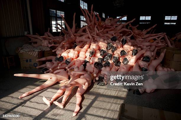 Inflatable sex dolls are stored in a warehouse at the Jiamei Plastic Toy Factory on February 19, 2012 in Ningbo, China. The Jiamei plastic toy...