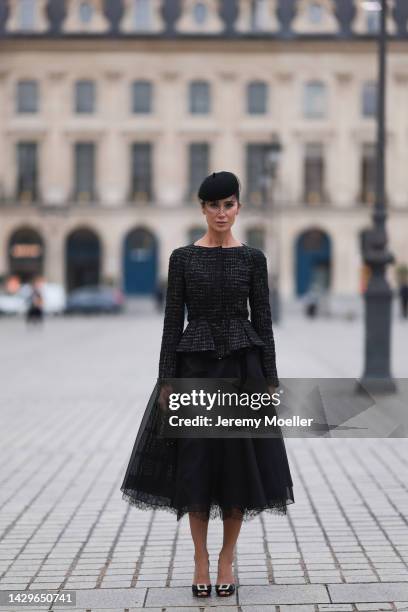 Sabina Jakubowicz seen wearing a black Giambattista Valli blazer and a black skirt by dior, outside Giambattista Valli during Paris Fashion Week on...