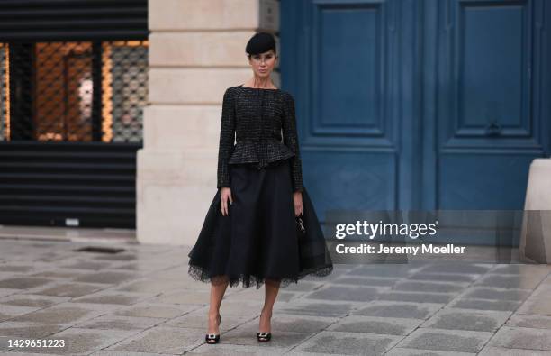 Sabina Jakubowicz seen wearing a black Giambattista Valli blazer and a black skirt by dior, outside Giambattista Valli during Paris Fashion Week on...
