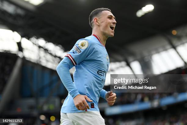 Phil Foden of Manchester City celebrates their sides sixth goal and their hat trick during the Premier League match between Manchester City and...