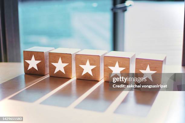 concept of excellence, five gold star, five - 5 stars stockfoto's en -beelden