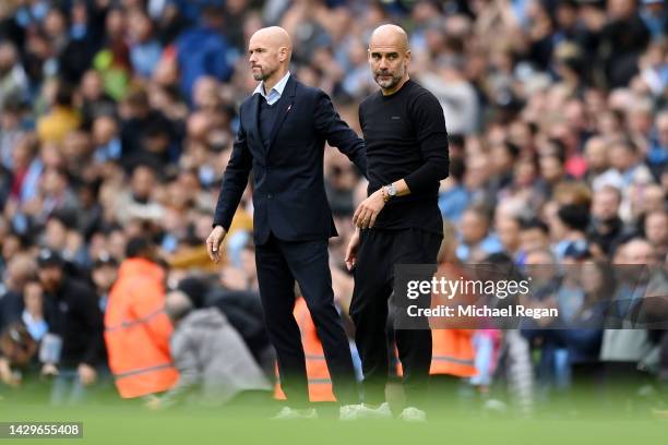 Pep Guardiola, Manager of Manchester City, and Erik ten Hag, Manager of Manchester United interact following the Premier League match between...