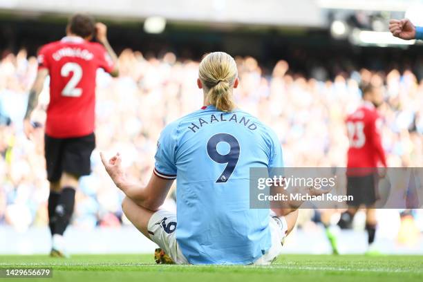 Erling Haaland of Manchester City celebrates their sides fifth goal and their hat trick during the Premier League match between Manchester City and...