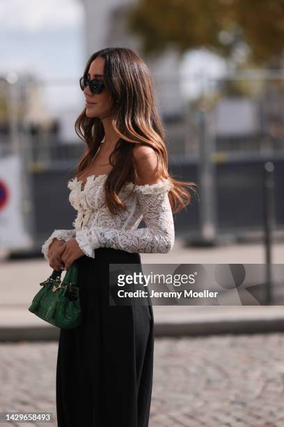 Tamara Kalinic seen wearing a total Giambattista Valli look, outside Giambattista Valli during Paris Fashion Week on September 30, 2022 in Paris,...