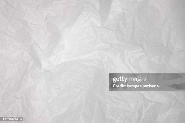 crumpled white wax paper or white paper texture pattern background. - papel de cera fotografías e imágenes de stock