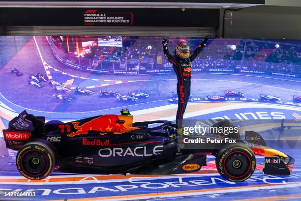 Sergio Perez of Mexico and Red Bull Racing celebrates finishing in first position during the F1 Grand Prix of Singapore at Marina Bay Street Circuit...