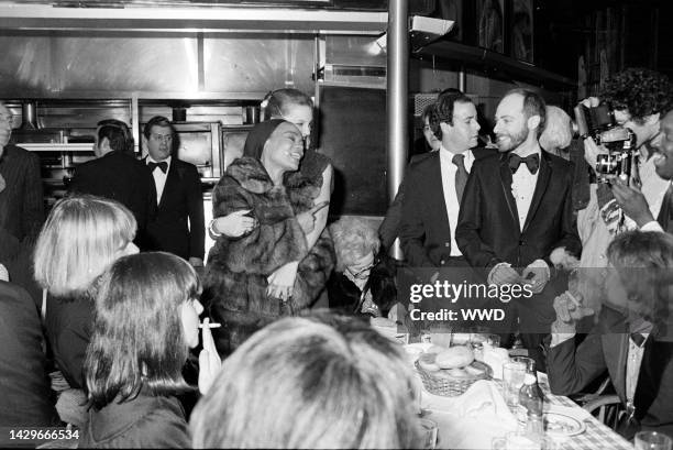 Eartha Kitt shares an embrace with her daughter, Kitt McDonald , during a party at Gallagher's in New York City on March 1, 1978.