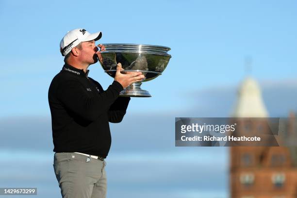 Ryan Fox of New Zealand kisses the trophy after winning the Alfred Dunhill Links Championship on the Old Course St. Andrews on October 02, 2022 in St...