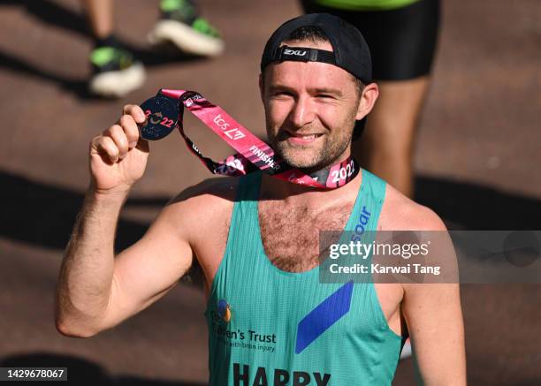 Harry Judd completes the 2022 TCS London Marathon on The Mall on October 02, 2022 in London, England.