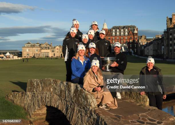Ryan Fox of New Zealand poses for a photograph with the trophy with a group of young Ukranian golfers on The Swilcan Bridge after his win in the...