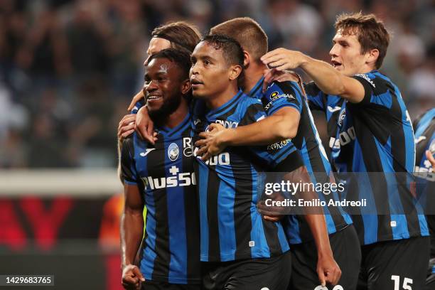 Ademola Lookman of Atalanta celebrates their sides first goal with team mate Luis Muriel of Atalanta during the Serie A match between Atalanta BC and...