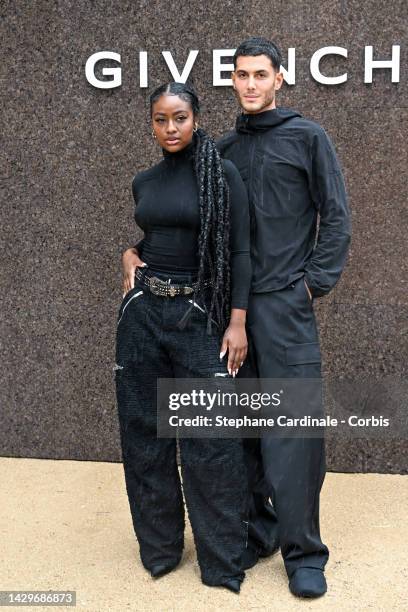 Justine Skye and Fai Khadra attend the Givenchy Womenswear Spring/Summer 2023 show as part of Paris Fashion Week on October 02, 2022 in Paris, France.