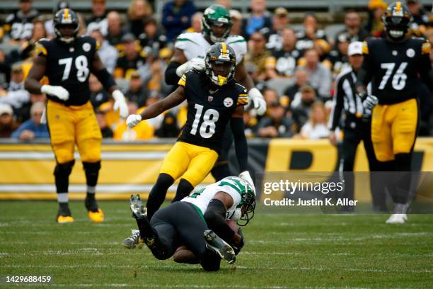 Lamarcus Joyner of the New York Jets makes an interception in the first quarter against the Pittsburgh Steelers at Acrisure Stadium on October 02,...