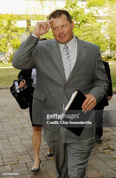 Former all-star baseball pitcher Roger Clemens arrives at the U.S. District Court for the first day of jury selection in his perjury and obstruction...